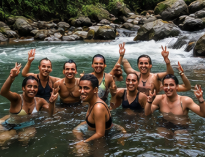 Friends enjoying a swim together at El Palo Waterfall